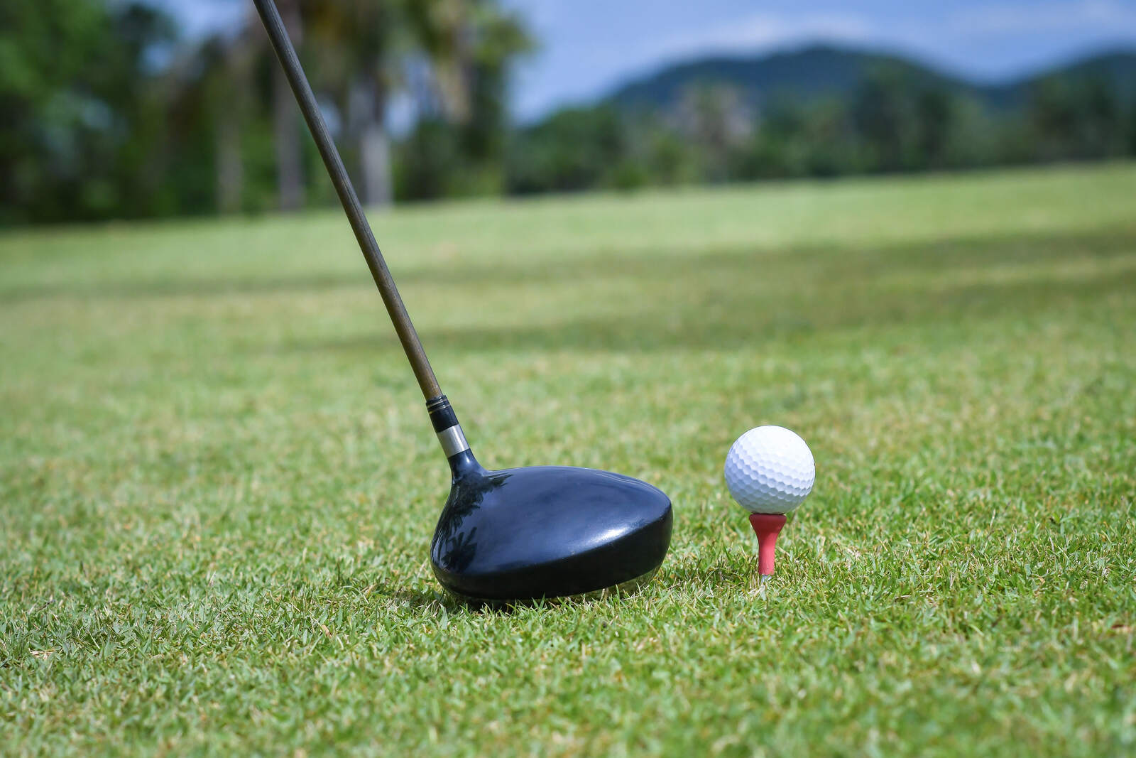 A golfer about to tee off at one of Hua Hin’s golf courses